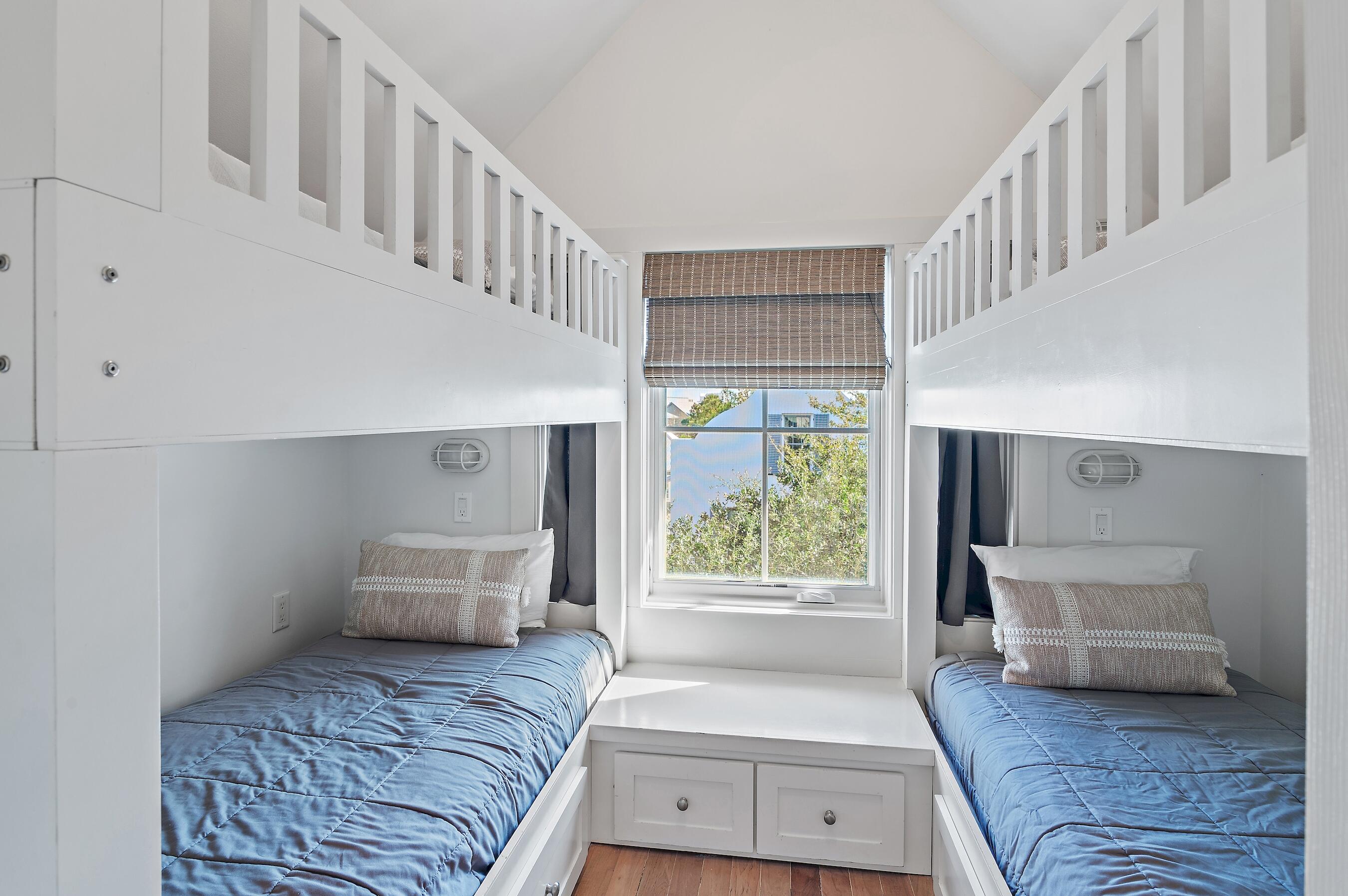 182 Kingston Road Inlet Beach, FL 32461 - Photo 35 of 55 a bedroom with a large bed and a couch