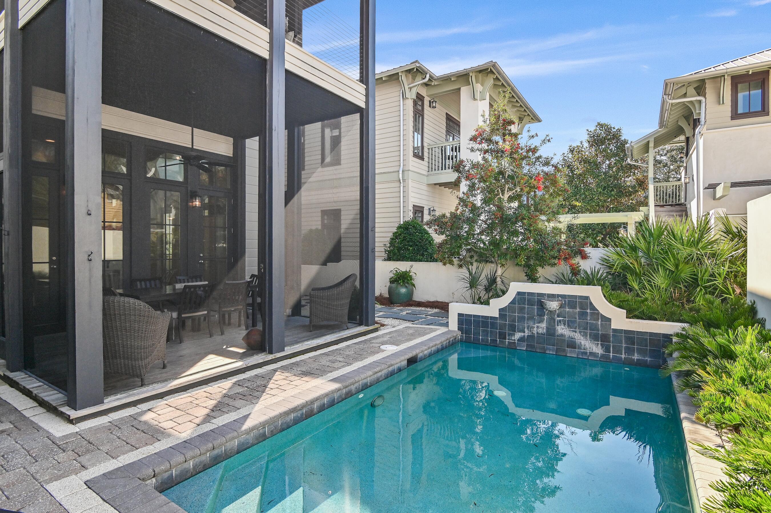 182 Kingston Road Inlet Beach, FL 32461 - Photo 41 of 55 a view of a patio with couches table and chairs and potted plants