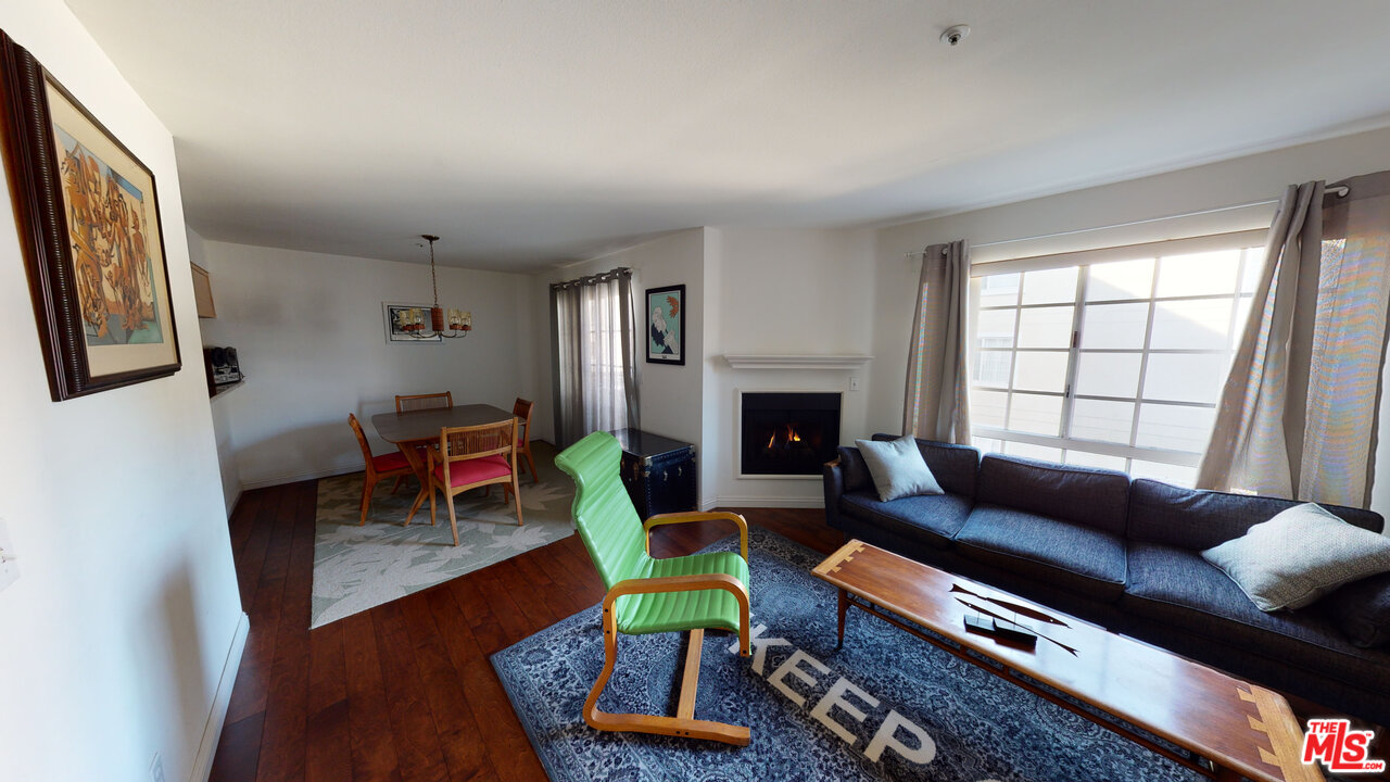 522 West Stocker Street, Unit 7 Glendale, CA 91202 - Photo 4 of 12 a living room with furniture and a fireplace