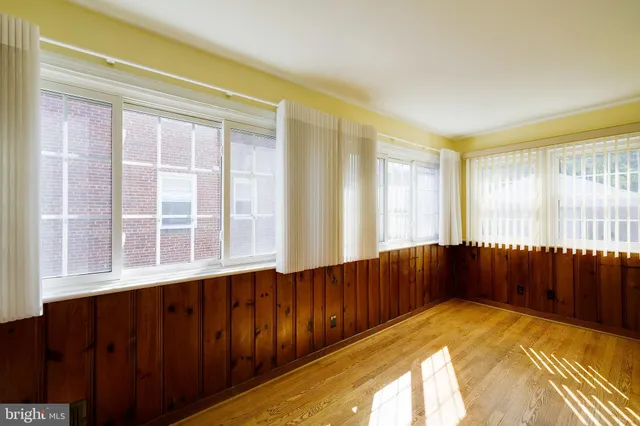 a view of a room with windows