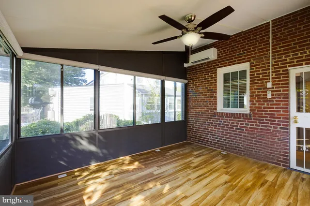 a view of an empty room and window