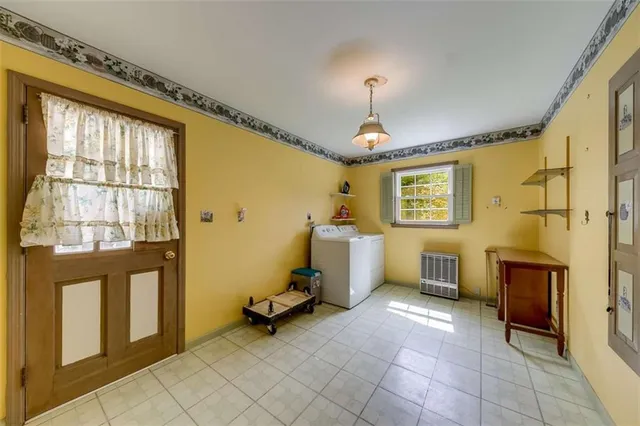 a view of a hallway with wooden shelves