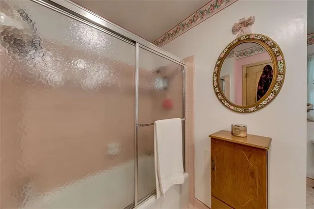 a view of a house with a yard and deck