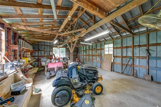 a view of a garden with a building