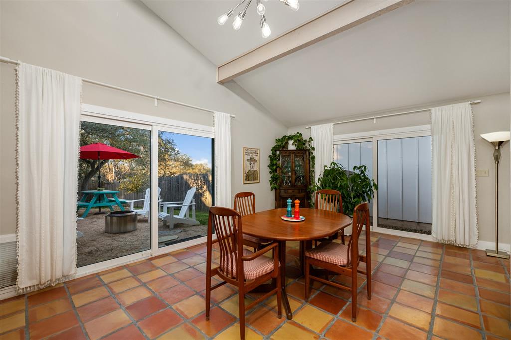 2210 Red Fox Road Austin, TX 78734 - Photo 18 of 40 Terracotta floors guide you to a private patio, perfect for enjoying outdoor moments.
