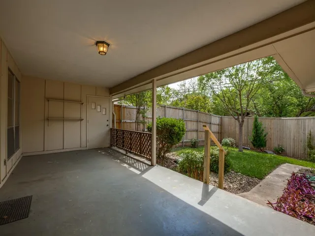 a view of a room with iron fence