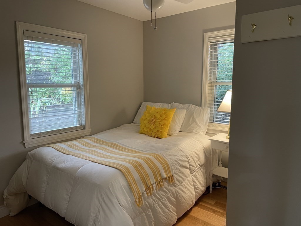 67 Colonial Road Weymouth, MA 02191 - Photo 12 of 31 a bedroom with a bed and window