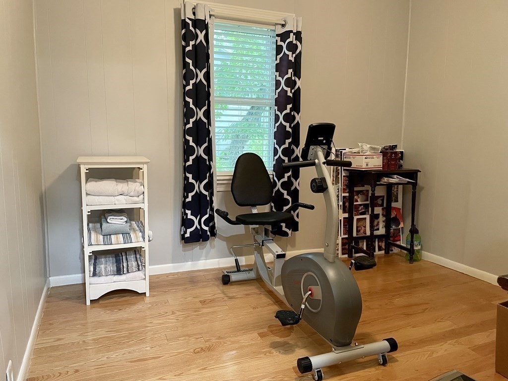 67 Colonial Road Weymouth, MA 02191 - Photo 13 of 31 a view of a room with gym equipment