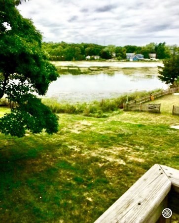 67 Colonial Road Weymouth, MA 02191 - Photo 17 of 31 a view of an ocean from a balcony