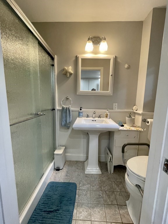 67 Colonial Road Weymouth, MA 02191 - Photo 19 of 31 a bathroom with a sink toilet and shower