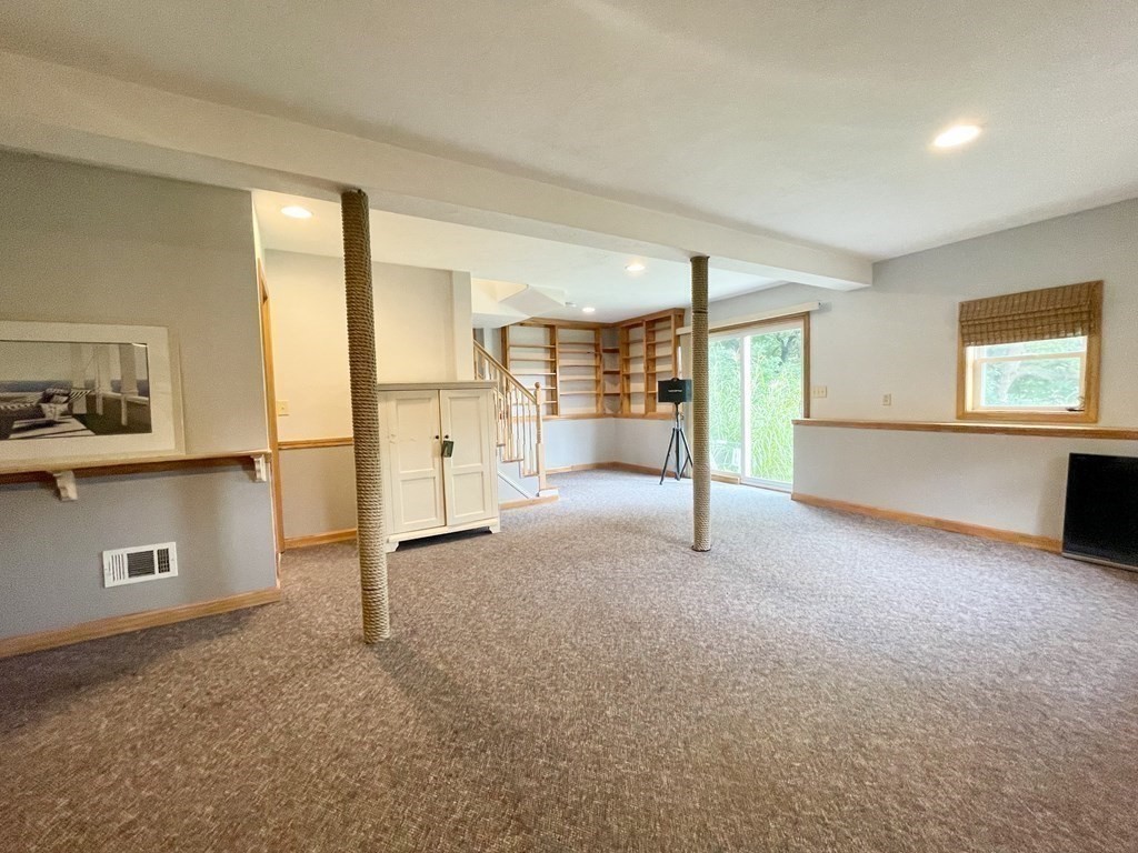 67 Colonial Road Weymouth, MA 02191 - Photo 20 of 31 a view of an empty room with a window