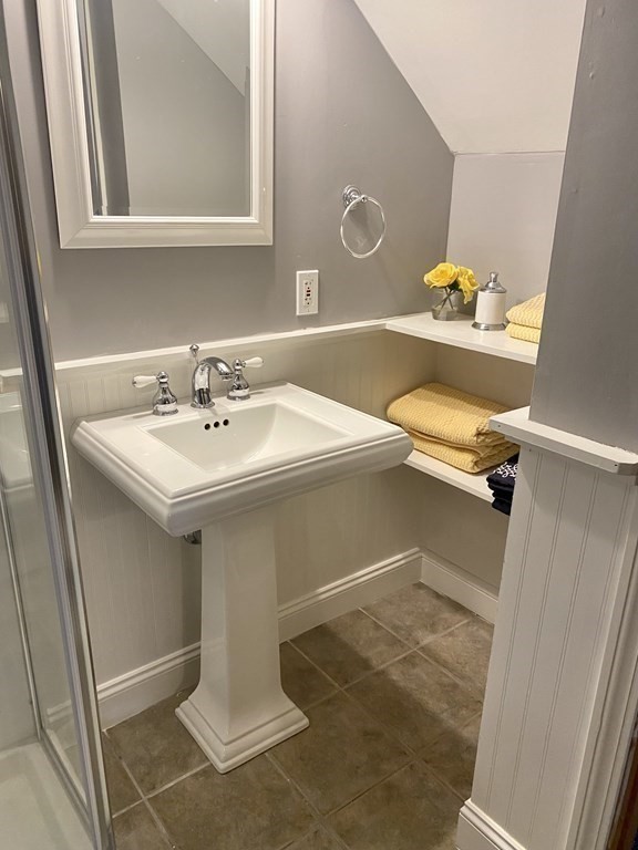 67 Colonial Road Weymouth, MA 02191 - Photo 22 of 31 a bathroom with a sink and a mirror