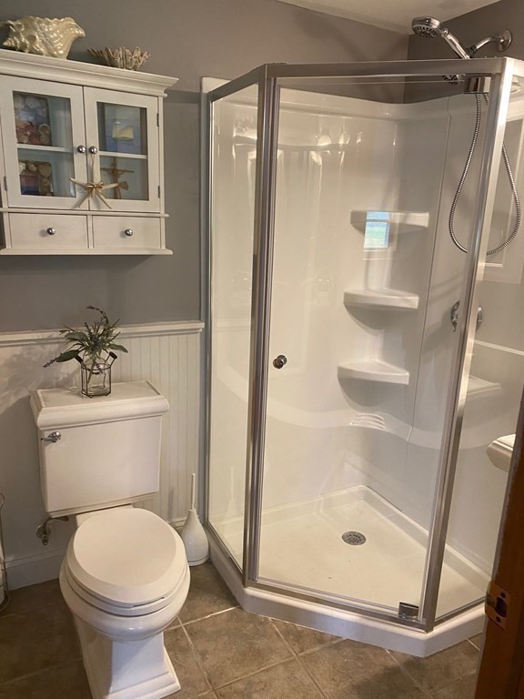 67 Colonial Road Weymouth, MA 02191 - Photo 23 of 31 a bathroom with a shower and a toilet