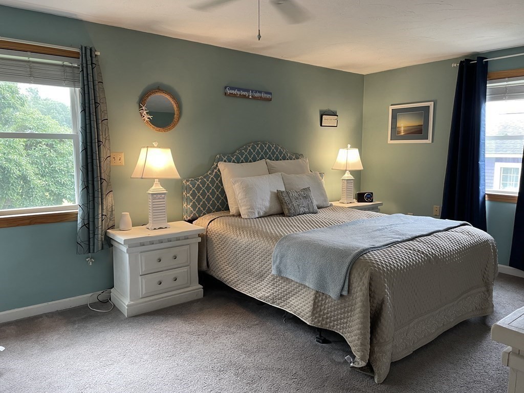 67 Colonial Road Weymouth, MA 02191 - Photo 10 of 31 a bedroom with a bed and a window