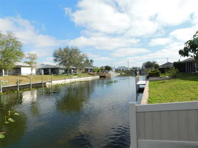 a view of a lake with houses
