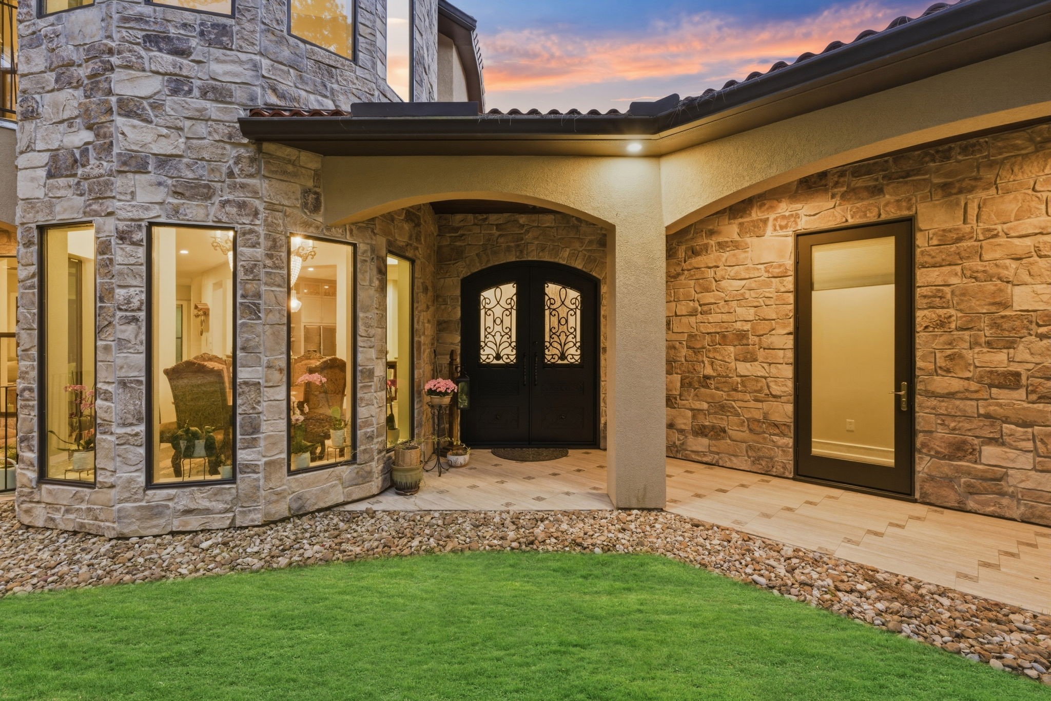 280 Sundog Road Huntsville, TX 77340 - Photo 6 of 50 Beautiful wrought iron front doors create a warm and inviting entry to the home.