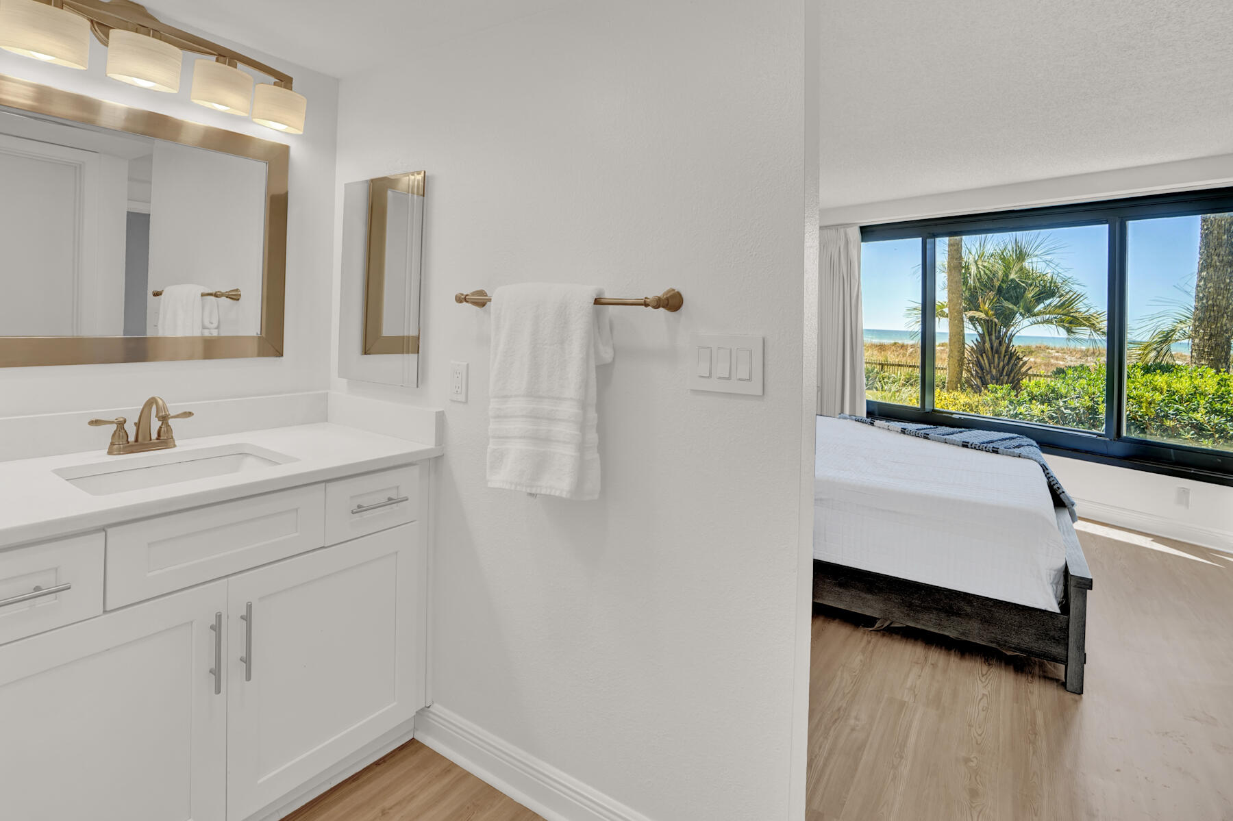 4202 Beachside 2, Unit 202 Miramar Beach, FL 32550 - Photo 13 of 45 a bathroom with a sink and a mirror