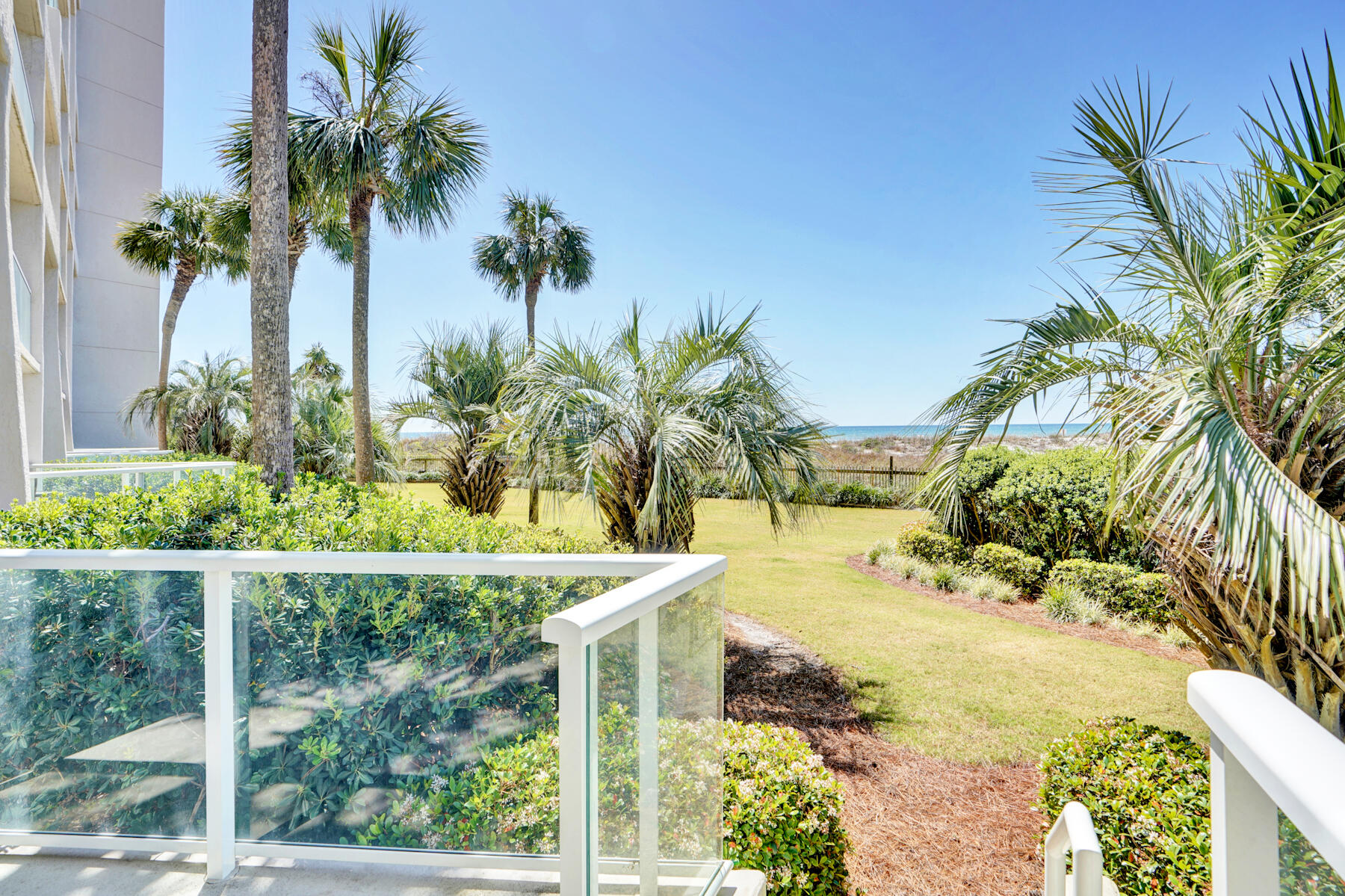 4202 Beachside 2, Unit 202 Miramar Beach, FL 32550 - Photo 21 of 45 a view of a swimming pool with a garden