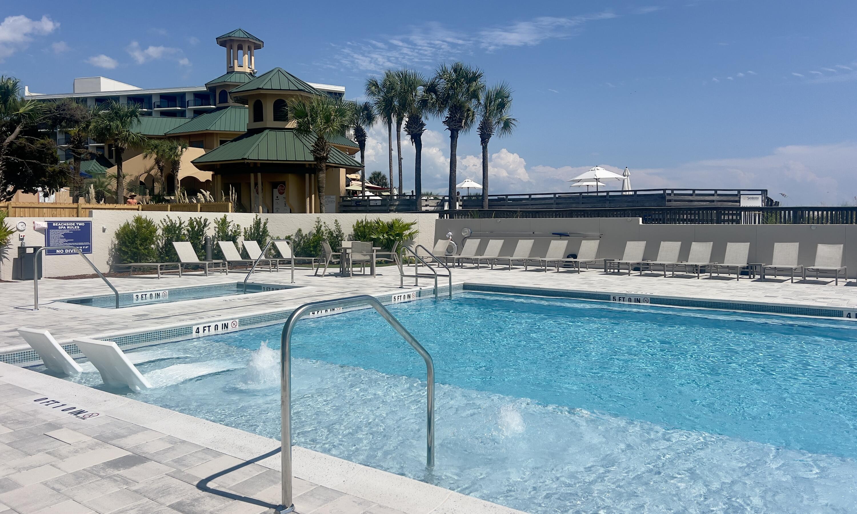 4202 Beachside 2, Unit 202 Miramar Beach, FL 32550 - Photo 25 of 45 a view of a swimming pool with a patio