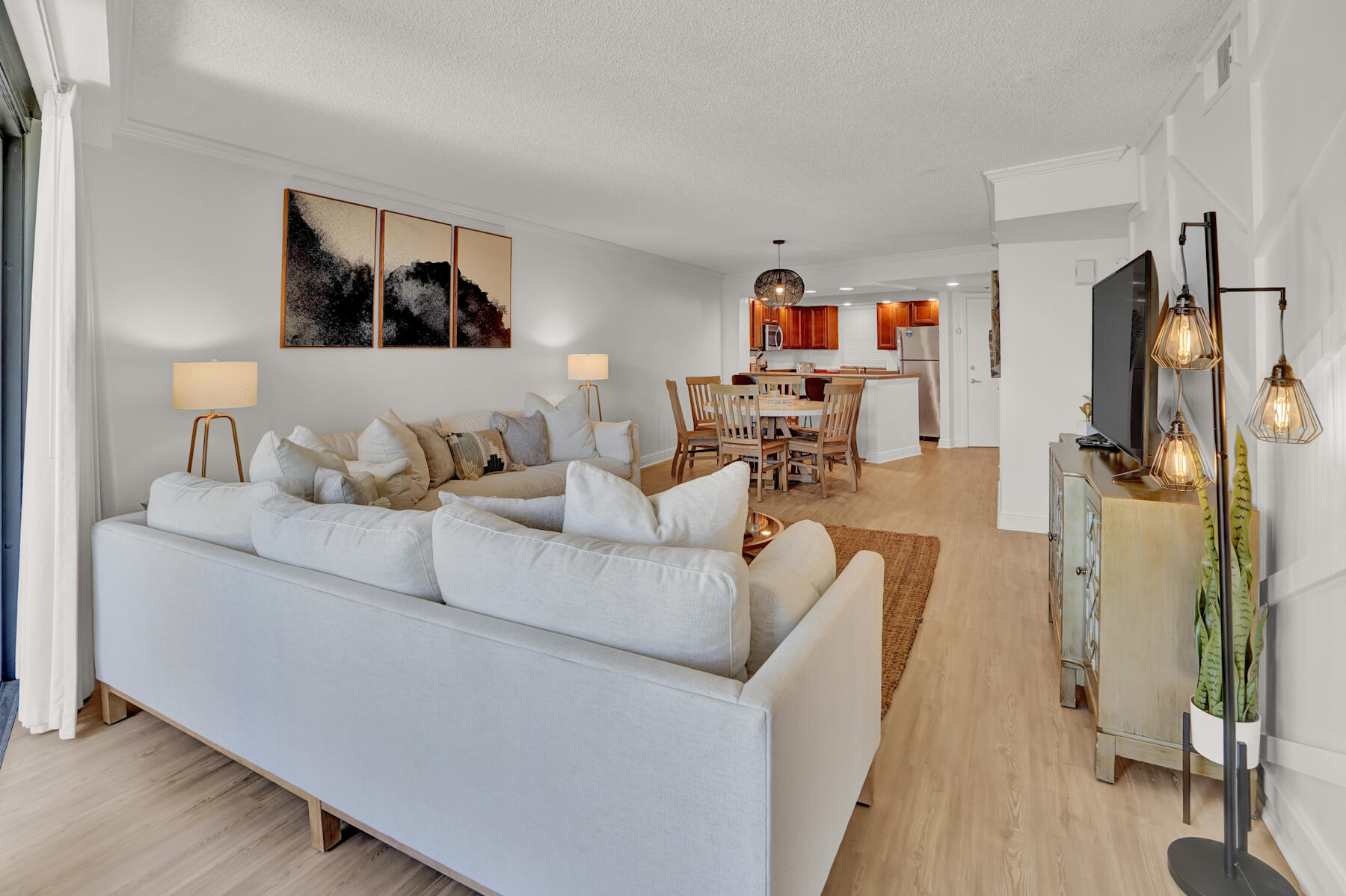 4202 Beachside 2, Unit 202 Miramar Beach, FL 32550 - Photo 4 of 45 a living room with furniture and a wooden floor