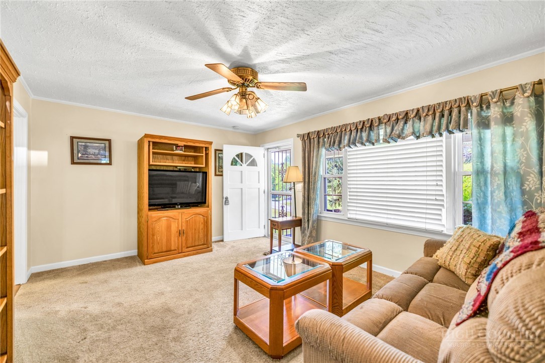 346 Piney Creek Road Lansing, NC 28643 - Photo 15 of 24 a living room with furniture and a large window