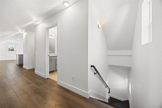 a view of entryway with wooden floor