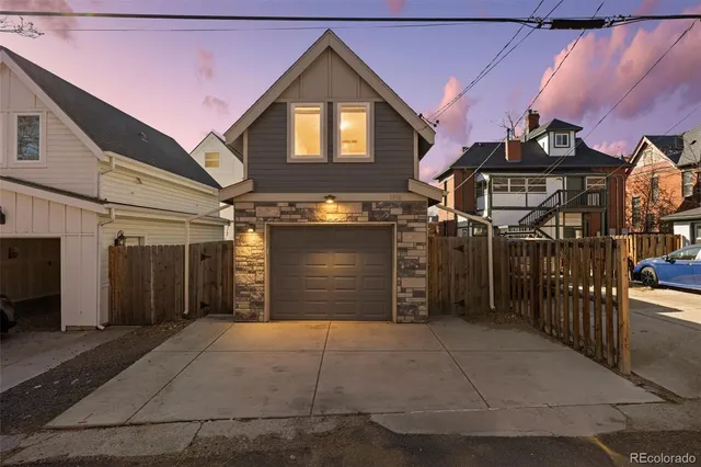 a view of a house with a garage