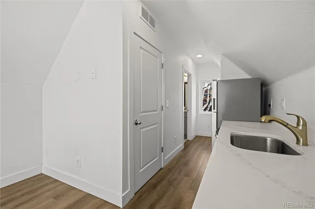 a bathroom with a sink and a shower