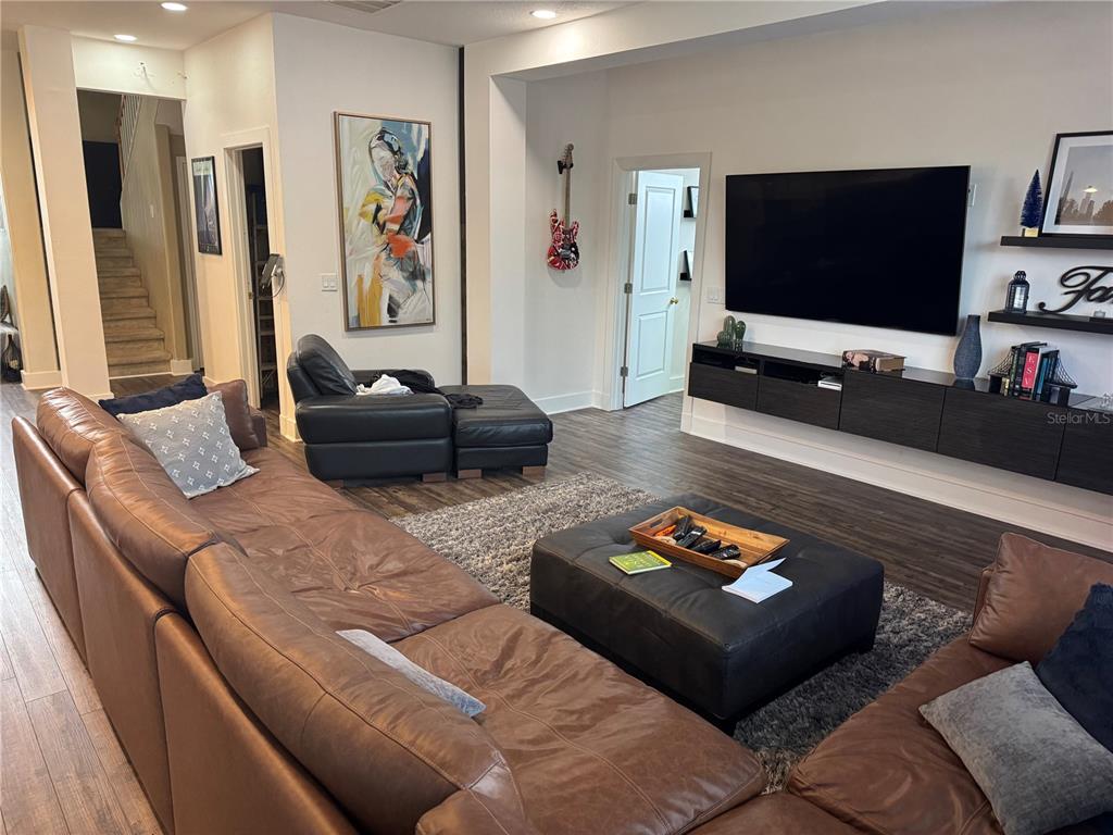 1449 Kaffir Lily Court Trinity, FL 34655 - Photo 17 of 53 a living room with furniture and a flat screen tv