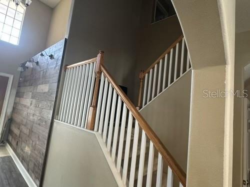 1449 Kaffir Lily Court Trinity, FL 34655 - Photo 26 of 53 a view of staircase with railing and white walls