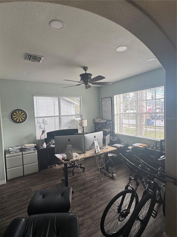 1449 Kaffir Lily Court Trinity, FL 34655 - Photo 4 of 53 a living room with furniture gym equipment and a large window