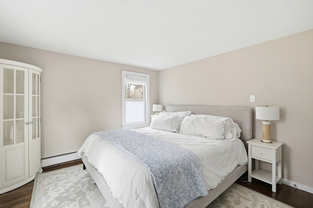 73 Shingle Mill Lane Hanover, MA 02339 - Photo 14 of 23 a bedroom with a bed and a window