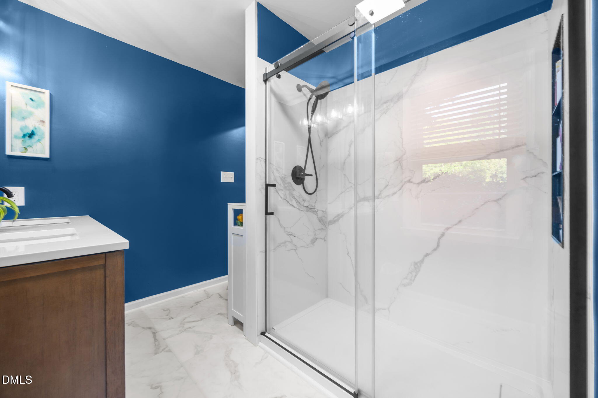 9433 Ferrell Road Zebulon, NC 27597 - Photo 19 of 38 a bathroom with a shower and a sink