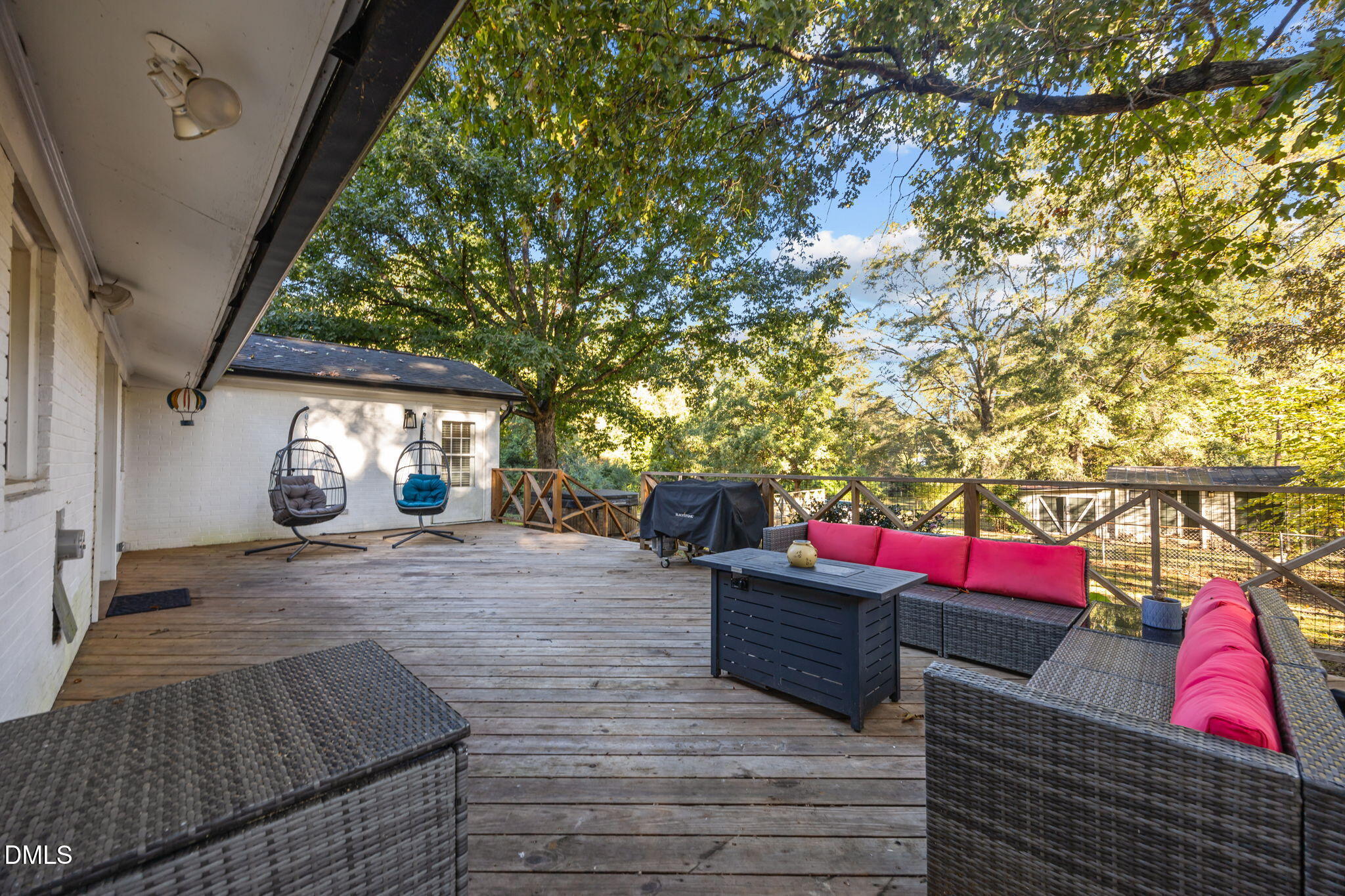 9433 Ferrell Road Zebulon, NC 27597 - Photo 21 of 38 a view of outdoor space & deck and living room