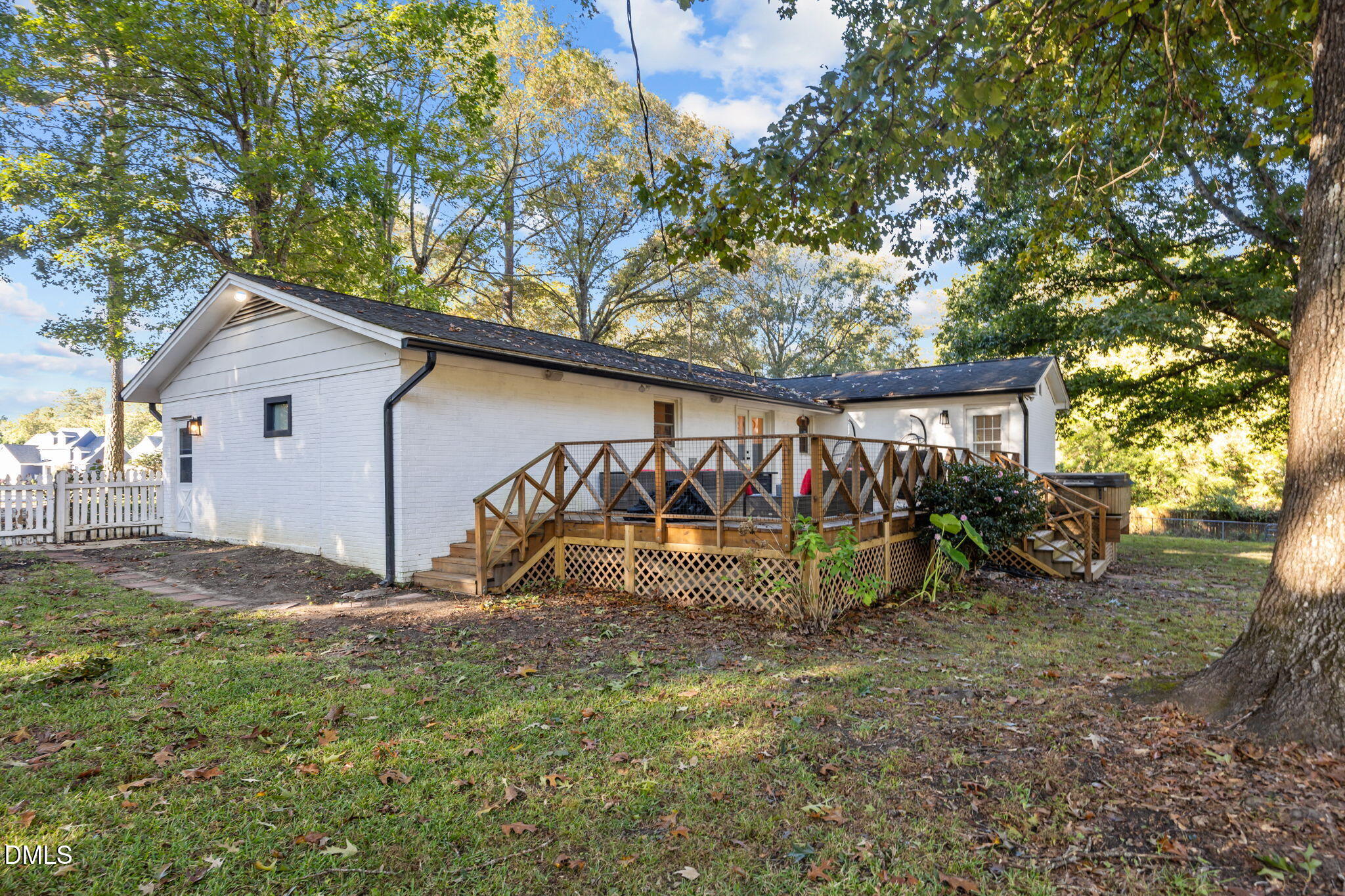 9433 Ferrell Road Zebulon, NC 27597 - Photo 25 of 38 a view of backyard with a table and chairs