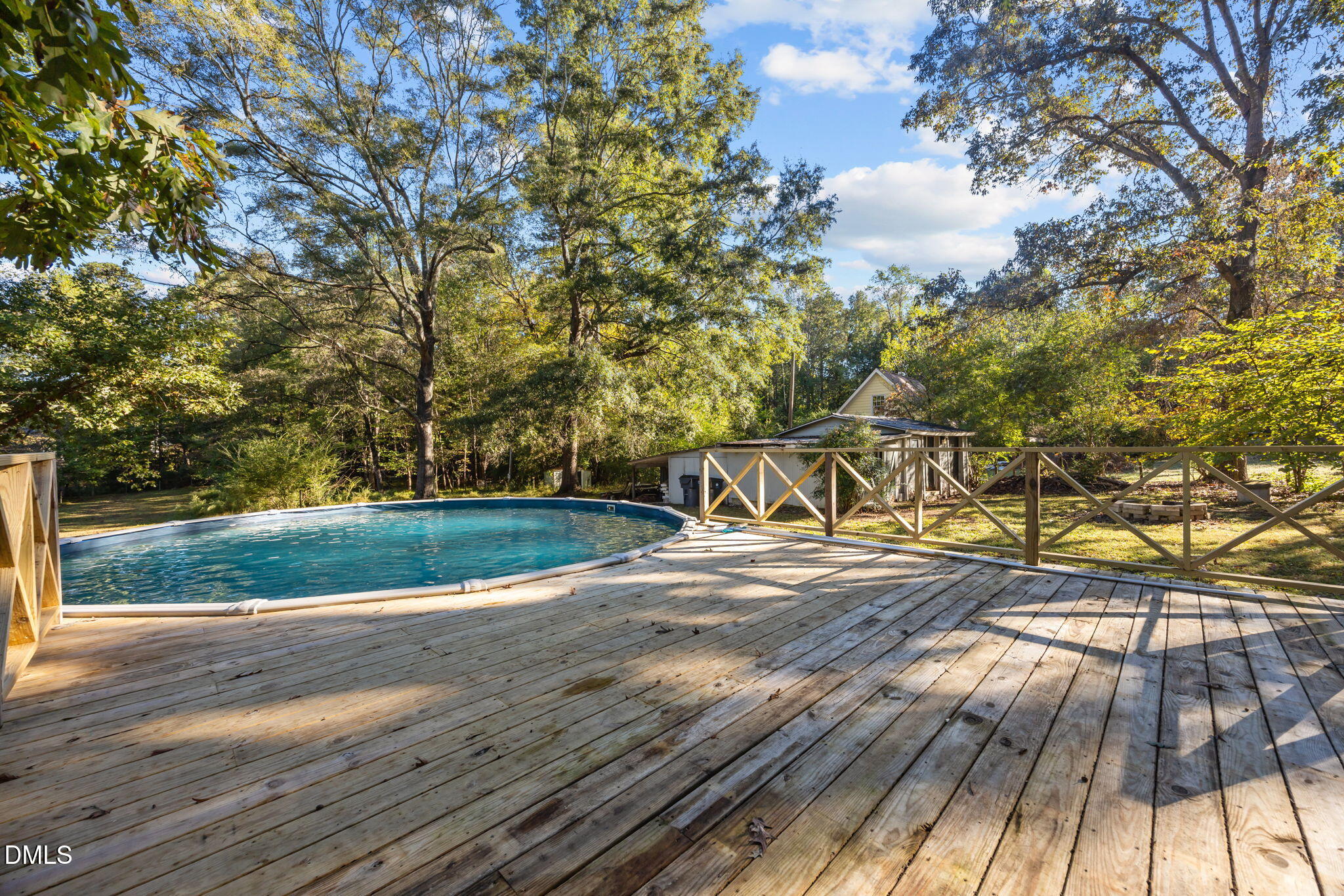 9433 Ferrell Road Zebulon, NC 27597 - Photo 29 of 38 a view of a yard with basketball court