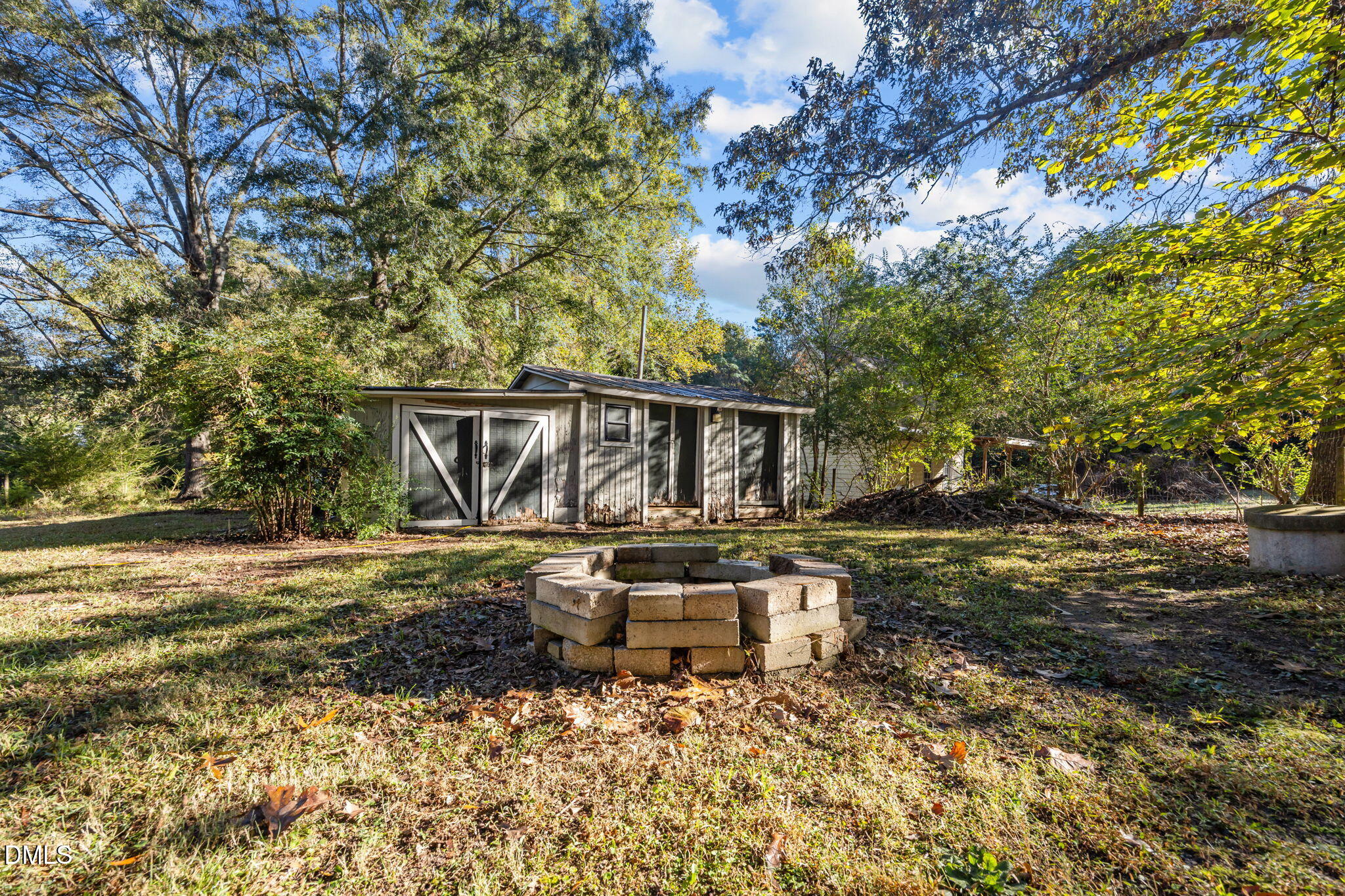 9433 Ferrell Road Zebulon, NC 27597 - Photo 35 of 38 a front view of a house with garden