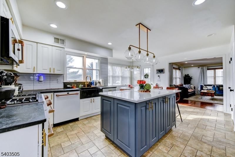 3 Fine Road Hillsborough, NJ 08844 - Photo 19 of 47 a kitchen with stainless steel appliances granite countertop a stove a sink dishwasher and a refrigerator