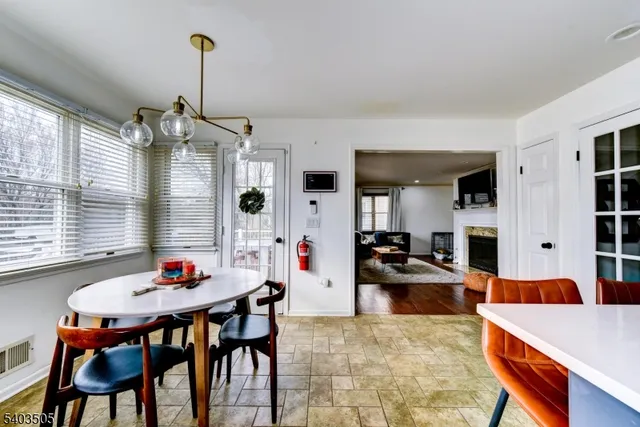a living room with furniture and a table