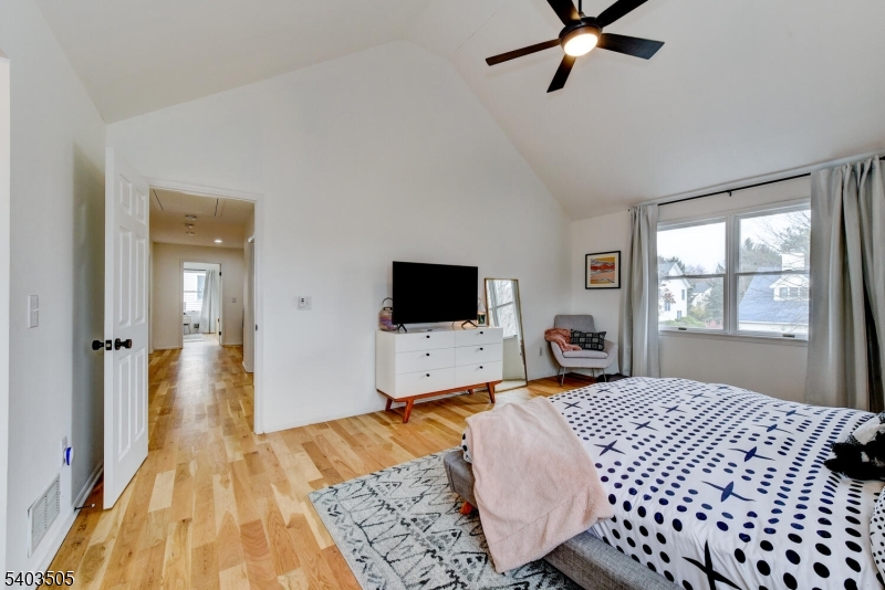 3 Fine Road Hillsborough, NJ 08844 - Photo 31 of 47 a bedroom with a bed and wooden floor