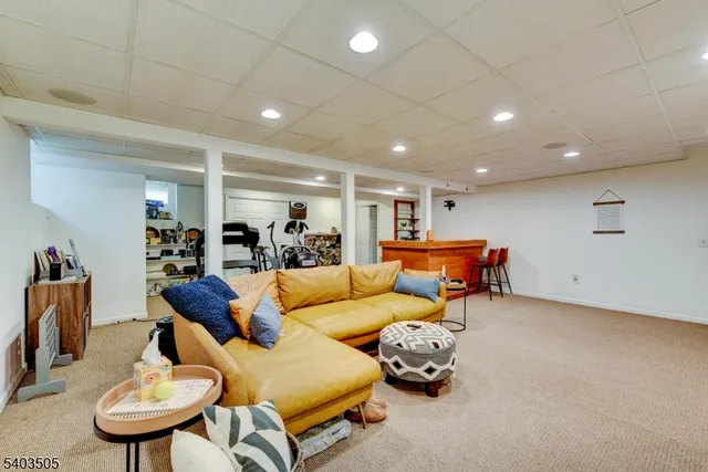 a living room with furniture and a table