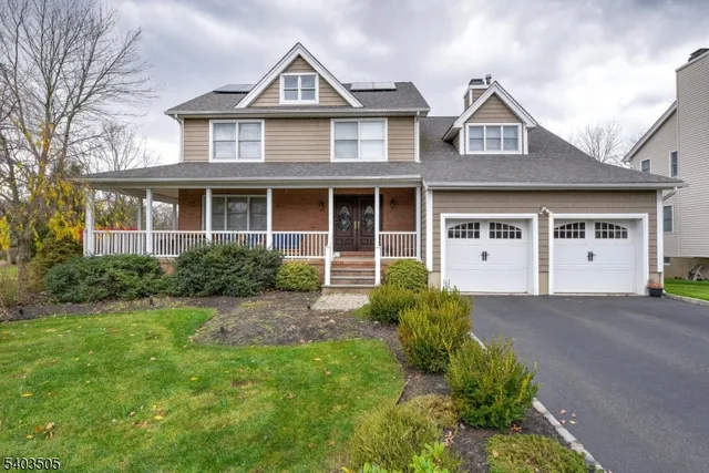 a front view of a house with yard