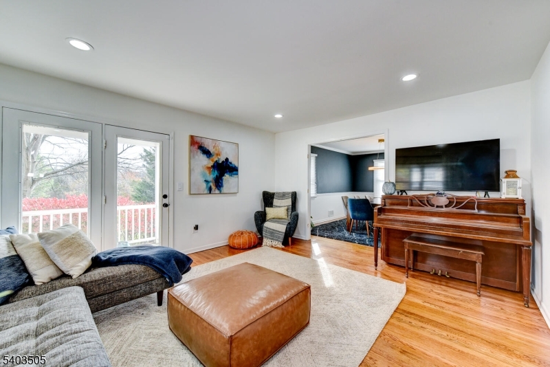 3 Fine Road Hillsborough, NJ 08844 - Photo 7 of 47 a living room with furniture and a flat screen tv
