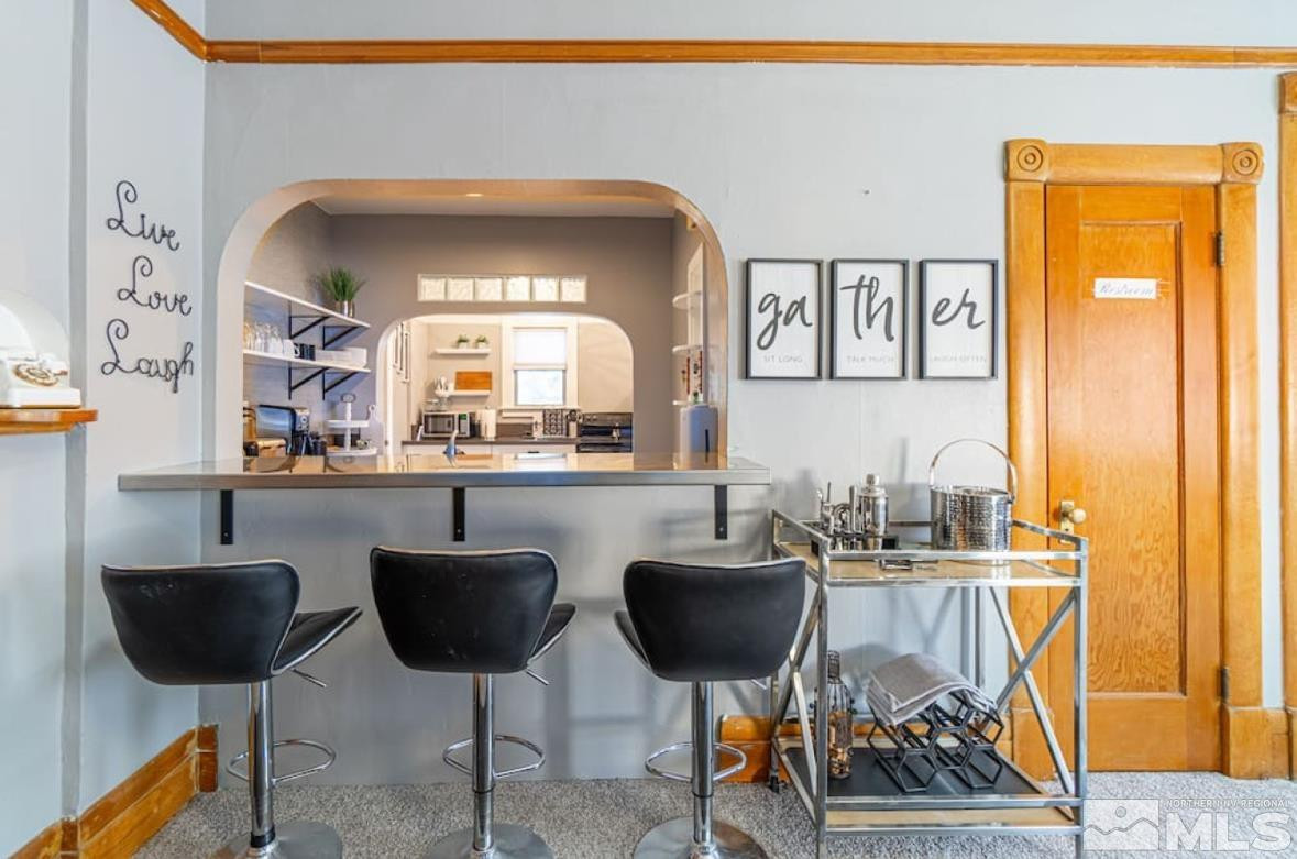 540 West 2nd Street Reno, NV 89503 - Photo 17 of 29 a kitchen with a dining table and chairs