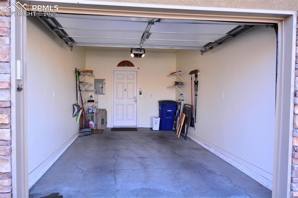 6967 Stetson Ranch Point, Unit 105 Colorado Springs, CO 80922 - Photo 22 of 37 a view of room with gym equipment
