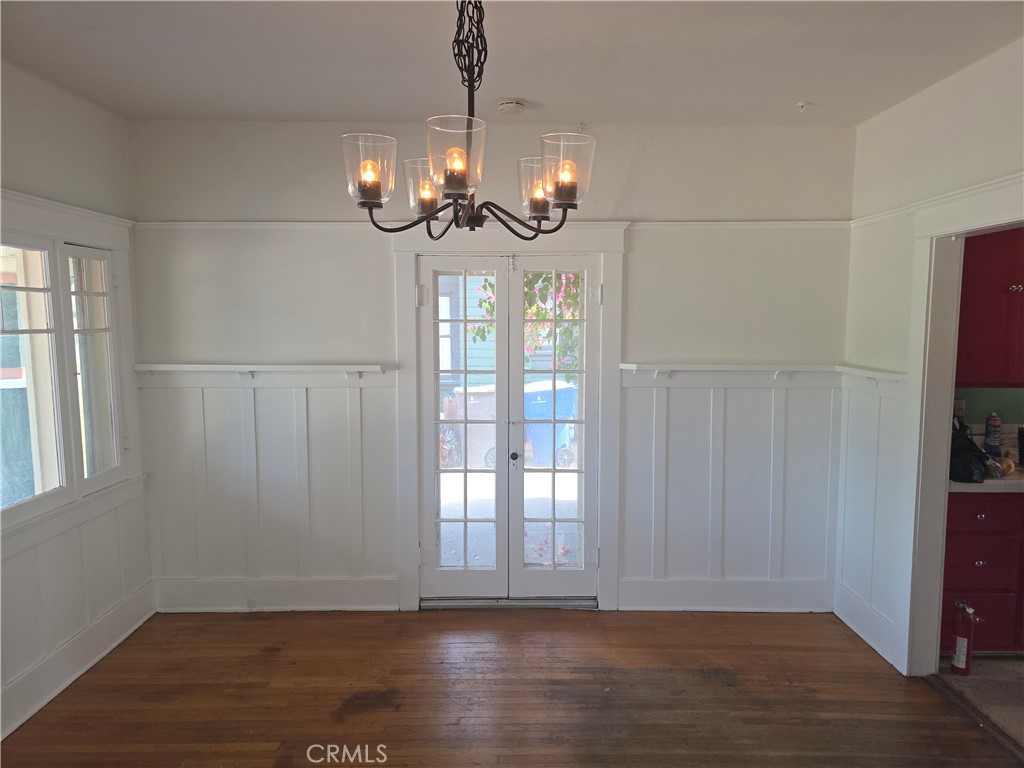 3992 Linwood Place Riverside, CA 92506 - Photo 5 of 9 a view of an empty room with wooden floor and fan