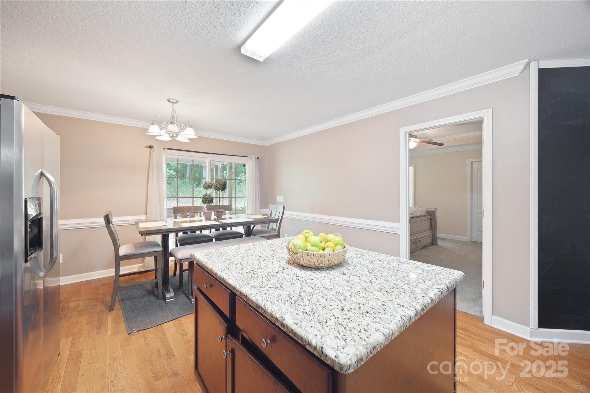 587 Kelly Road York, SC 29745 - Photo 12 of 28 a kitchen with a table and chairs