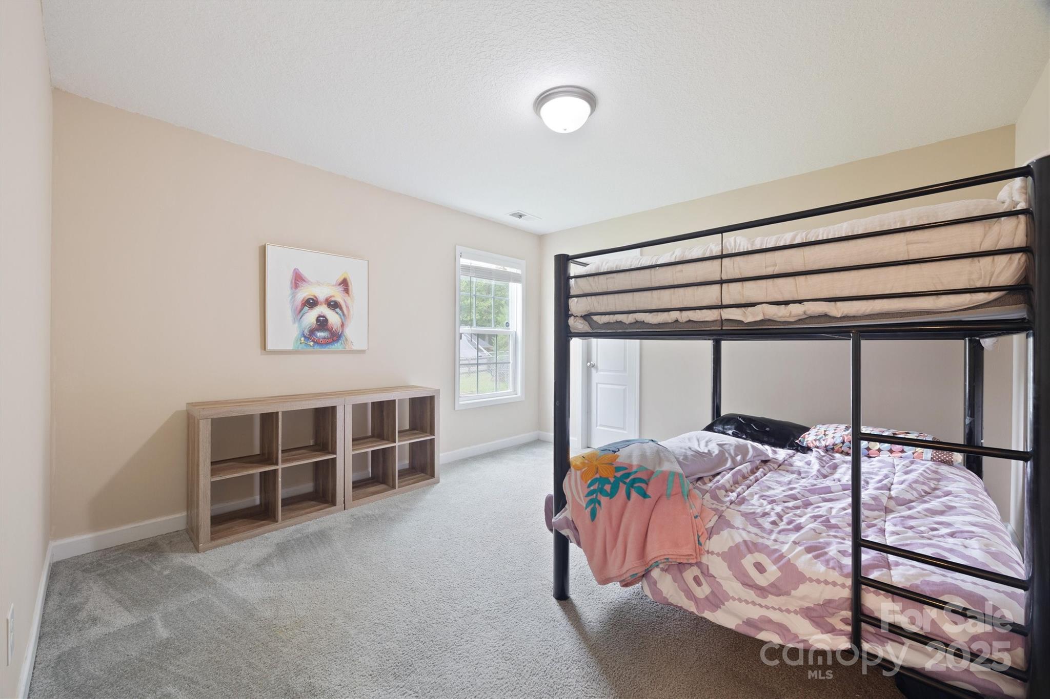 587 Kelly Road York, SC 29745 - Photo 17 of 28 a bedroom with a bed and a window
