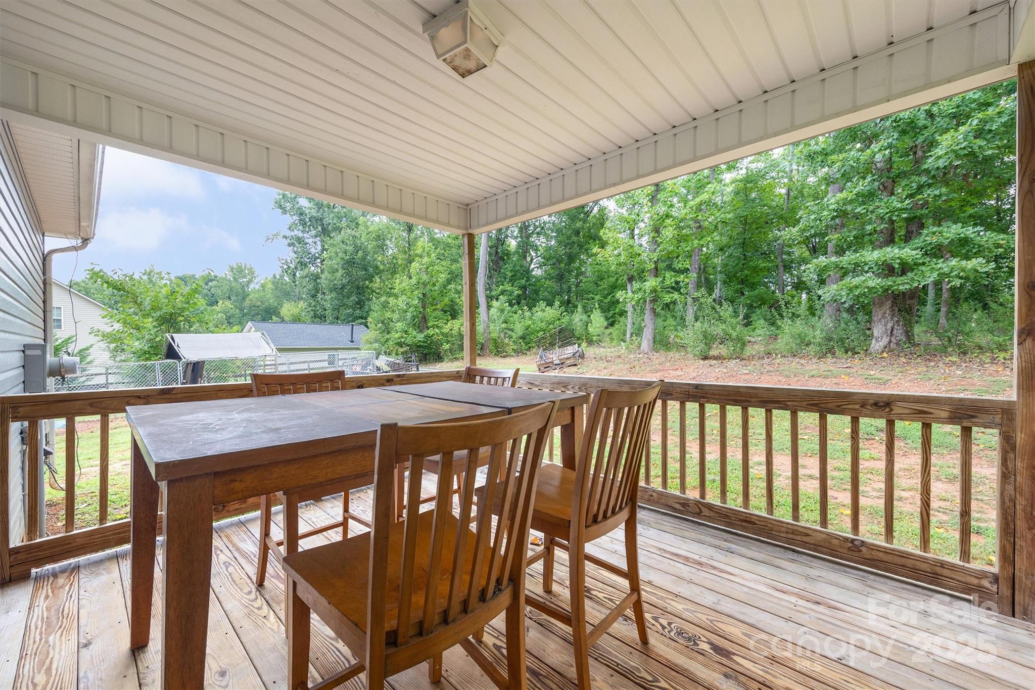 587 Kelly Road York, SC 29745 - Photo 23 of 28 a view of balcony with wooden floor and outdoor seating