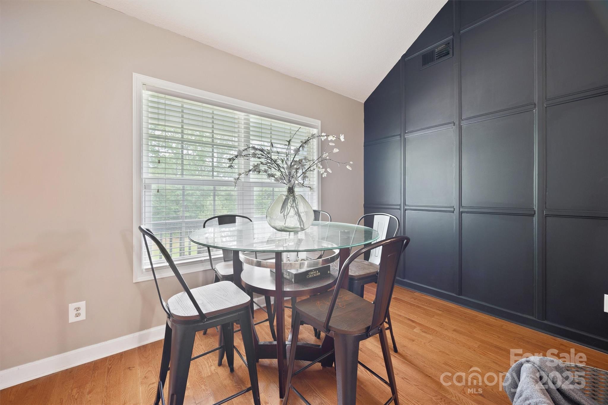 587 Kelly Road York, SC 29745 - Photo 4 of 28 a view of a dining room with furniture and wooden floor